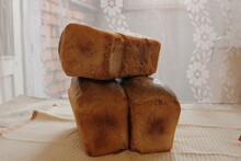 Fresh Crispy Three Bricks Of Bread With A Golden Crust