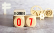© Uladzislau - December 7th. Image of December 7 wooden color calendar on white canvas background. empty space for text.