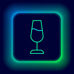 Sticker - Glowing neon line Wine glass icon isolated on black background. Wineglass sign. Colorful outline concept. Vector