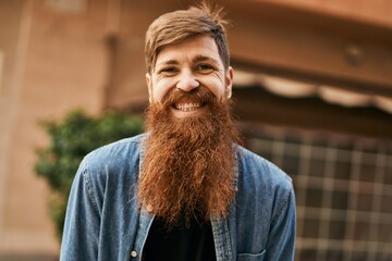 Sticker - Young irish hipster man smiling happy standing at the city.