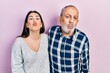 © Krakenimages.com - Hispanic father and daughter wearing casual clothes looking at the camera blowing a kiss on air being lovely and sexy. love expression.