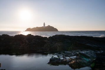 Poster - Godrevy lighthouse at sunset in Cornwall. United Kingdom