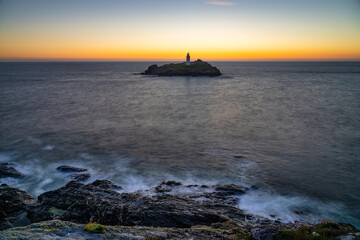 Poster - Godrevy lighthouse at sunset in Cornwall. United Kingdom