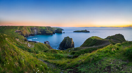 Sticker - Mullion Cove at sunset in Cornwall. United Kingdom