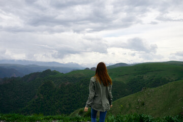 Wall Mural - woman hiker mountains landscape travel freedom fresh air