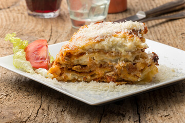 Wall Mural - lasagna on a white plate