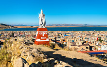 Manco Capac Monument In Puno With Views Of Lake Titicaca In Peru