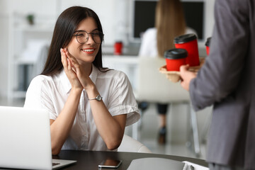 Canvas Print - Business people having coffee break in office