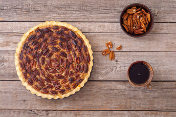 Traditional American autumn dessert . Pecan pie