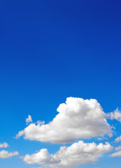 Canvas Print - White clouds in blue sky