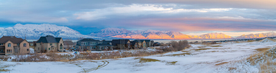 Wall Mural - Snow covered field outside the residential area at Saratoga Springs in Utah