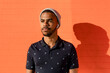 © Rawpixel.com - Teen boy portrait, African Amercian with bright wall background