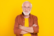 Photo Of Positive Granddad Folded Arms Look Posing Wear Spectacles Brown Shirt Isolated Yellow Color Background
