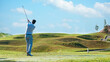 © freebird7977 - Golfer sport course golf ball fairway.  People lifestyle man playing game and swing golf tee off on the green grass.  Asian man player game shot in summer.  Healthy and Sport outdoor