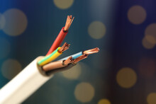 Cable With Copper Wires Against Blurred Background, Closeup