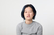 © oqba - Young attractive Asian chinese malay woman pose face body expression mode emotion on white background wink