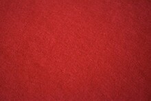 A Red Felt Background In Horizontal