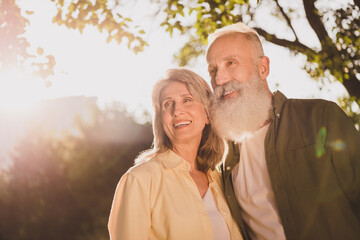 Wall Mural - Photo of old people white haired man woman marriage harmony look dream nature spring weekend outdoors outside in park