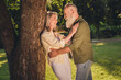 © deagreez - Profile side photo of senior couple date romantic love story hug cuddle wood forest nature spring outdoors