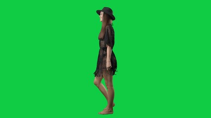 Wall Mural - Side view of walking pretty summer woman greeting and sending kisses. Full body isolated on green screen background