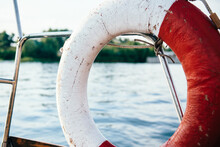 Old Lifebuoy In Red And White On  The Yacht