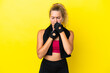 © luismolinero - Sport woman with towel isolated on yellow background is suffering with cough and feeling bad