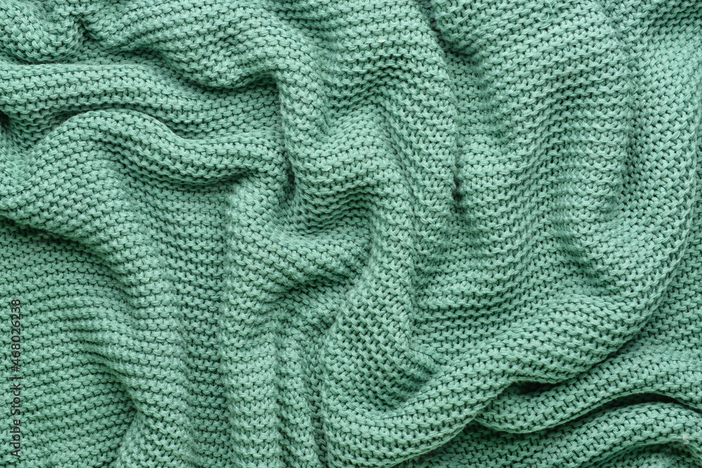 Texture of crumpled knitted fabric as background