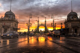 Fototapeta Londyn -  A beautiful surreal sunset light on Liberty Bridge, Budapest after rain