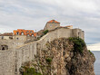 View of Adriatic Sea and city wall around ancient of Dubrovnik in Croatia. 