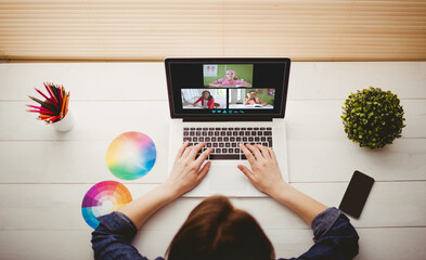 Poster - Caucasian woman using laptop for video call, with smiling diverse elementary school pupils on screen