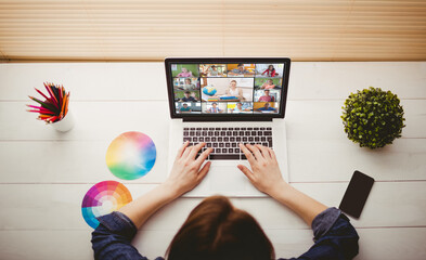 Poster - Caucasian woman using laptop for video call, with smiling diverse elementary school pupils on screen