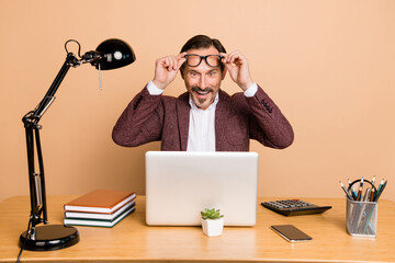 Sticker - Portrait of attractive amazed cheerful man it finance economist good profit isolated over beige color background