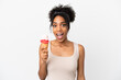 © luismolinero - Young african american woman with a cornet ice cream isolated on white background with surprise facial expression