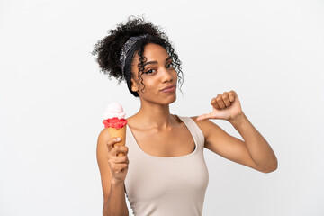 Sticker - Young african american woman with a cornet ice cream isolated on white background proud and self-satisfied