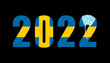 2022 with flag of Sweden and medical mask for protection against covid on black background