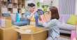 © ryanking999 - couple open delivery boxes