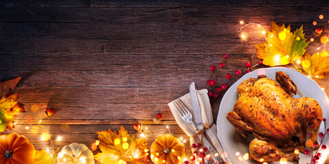 Turkey - Thanksgiving Celebration - Table Setting With Silverware And Autumnal Decoration On Wooden Plank