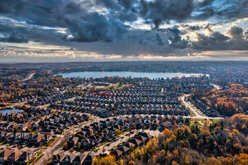 Wall Mural - sun set Drone views of the lake and residential homes in Richmond Hill Ontario 