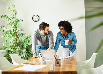 Wall Mural - young business people meeting office teamwork happy  success corporate discussion casual startup desk