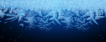 Icy, Frosty Pattern On The Window Glass. Background For Christmas And New Year. Macro. Close Up