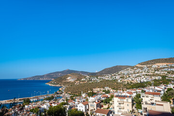 Wall Mural - Kalkan, Turkey, landscape, the view of sea and city of Kalkan, a popular resort town in Turkey during summer time.