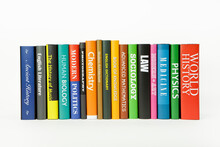 A Row Of Books With Various Subjects.
(note: All Titles Are Fabricated For This Image)
