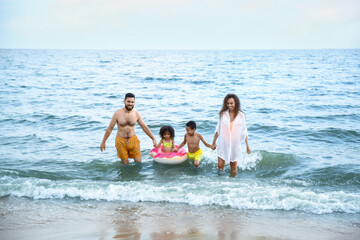 Poster - Happy family swimming in sea