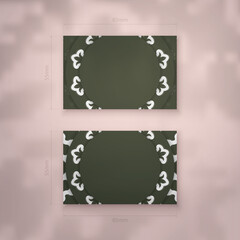 Wall Mural - A dark green business card with a luxurious white pattern for your business.