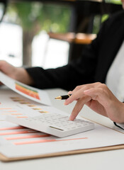 Fototapete - Business woman working with new startup project, discussion and analysis data the charts and graphs, computer using, Business finances and strategy accounting concept
