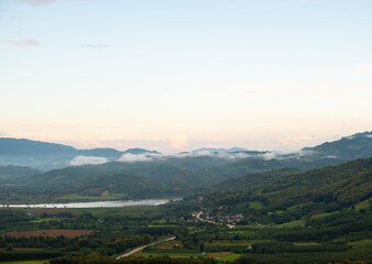 Wall Mural - landscape with clouds,sky and mountains of northern thailand.the mountain splits between chiang khon