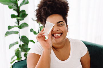 Woman with skin care cream product