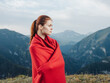 © SHOTPRIME STUDIO - woman on the mountains hiding with a plaid vacation travel