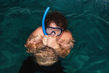 Fototapeta  - Funny fat guy in the pool.