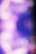 Leinwandbild Motiv illuminated pink, blue and purple party lights bokeh background